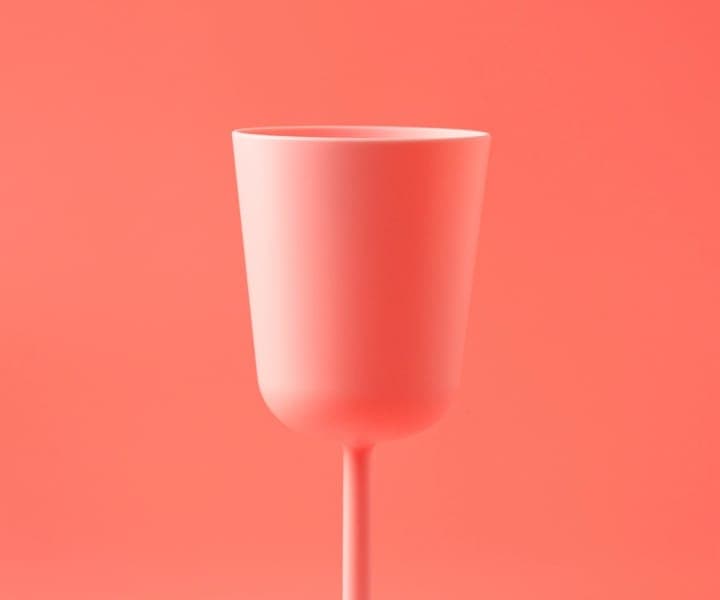 Pink glass on a pink background.